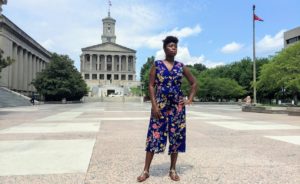 Charlane Oliver, standing in front of the Tennessee State Capitol in Nashville, helped lead a massive, statewide voter registration effort in the state. But less than a year later, voting rights activists like her are facing new restrictions and potential criminal penalties.