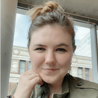 KATY BUTLER (SHE/HER)